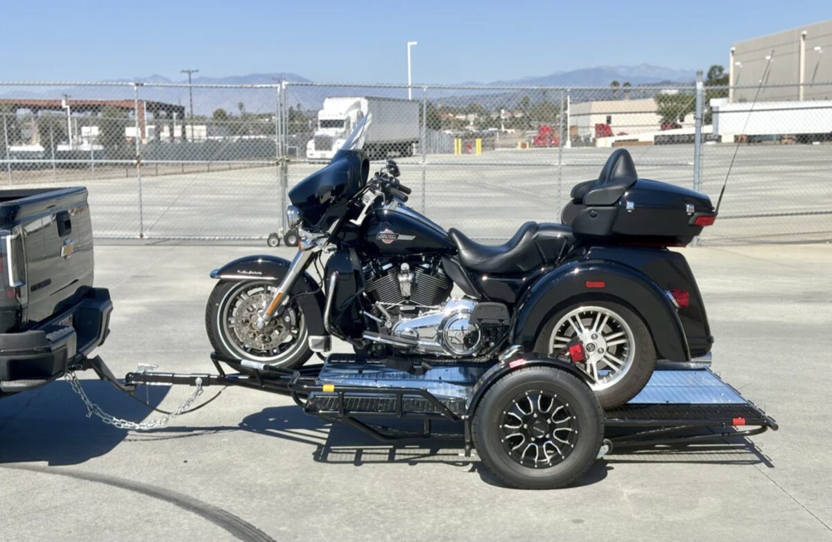 Motorcycle secured on a trailer for transport